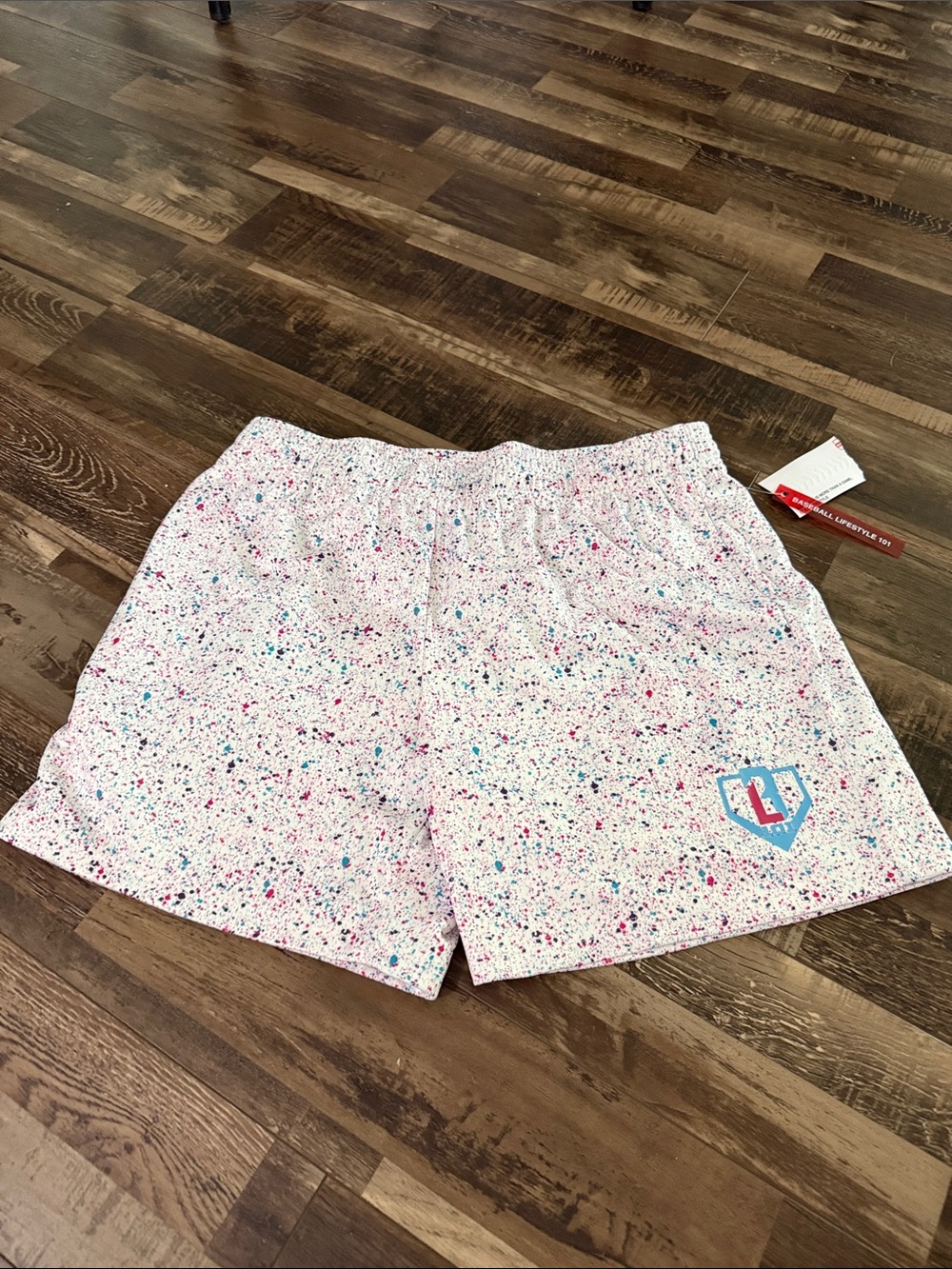 Speckled Pink Athletic Shorts with Blue Heart Accent